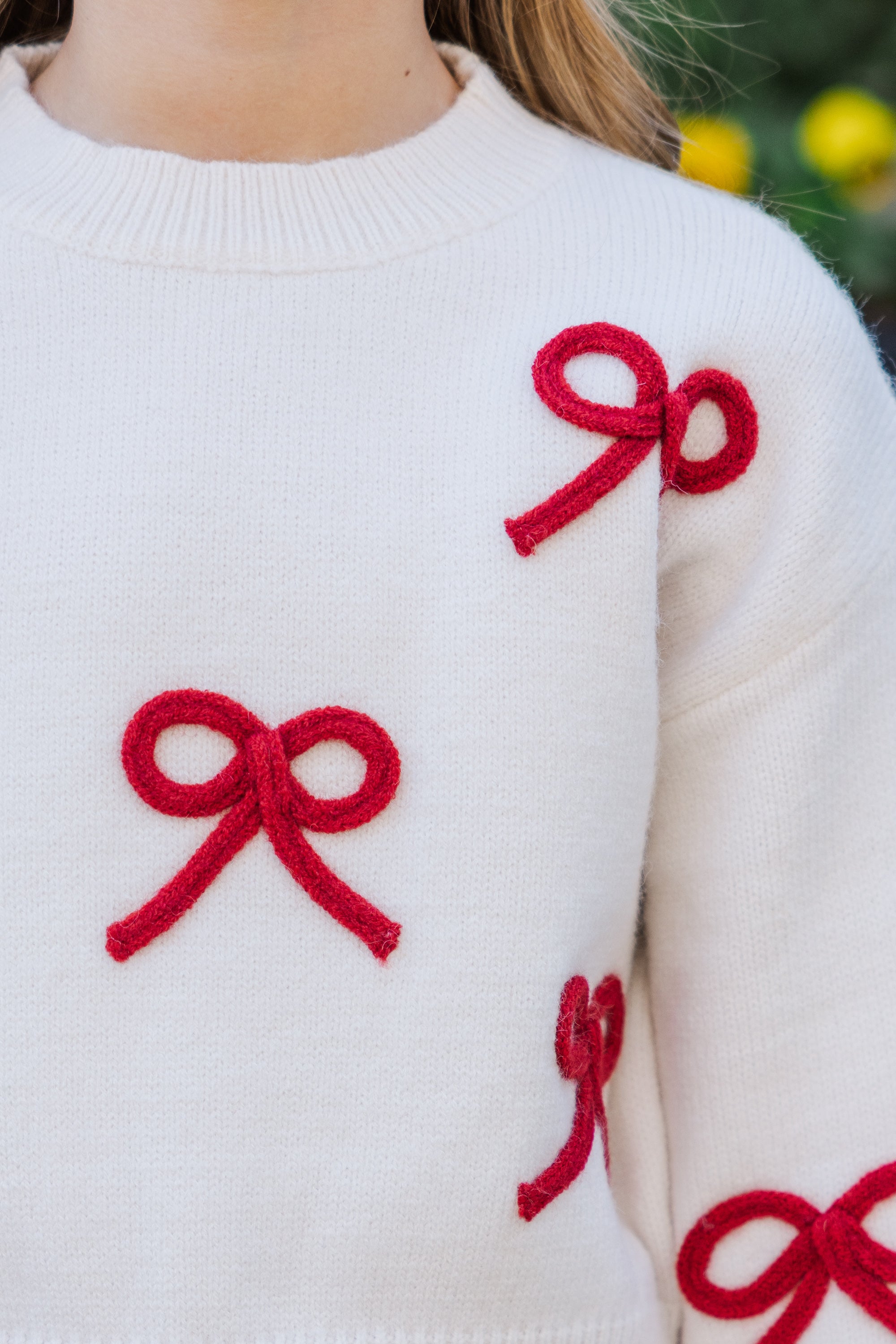 Girls' Alyson Cream Bow Sweater: A Festive Must-Have!